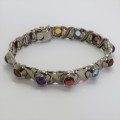 Costume silver look-alike bracelet with colored stones