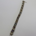 Costume silver look-alike bracelet with colored stones