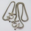 Costume set with silver look-alike necklace and bracelet - Necklace length 45 cm (open)