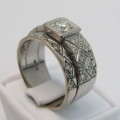 18kt White gold ring with 0.40ct diamond and 26 smaller diamonds - weighs 15.0g - size T/10