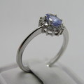 9kt white gold ring with 0.48ct tanzanite and diamonds of 0.11ct in total - weighs 2.4g - size M/6