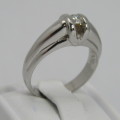 18kt white gold diamond ring with 0.15ct diamond - weighs 7.0g -size O/7 - new