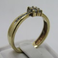 9kt gold ring with 14 small diamonds of about 0.25ct in total - weighs 2.9g - size Q/8