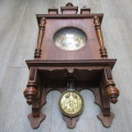 German Vrijslinger wall clock with South African teak case