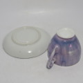 Vintage porcelain cup and saucer