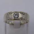 Sterling Silver ring with clear stones - weighs 8.8 grams - size Z/13