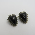 Pair of vintage clip on earrings with black inserts