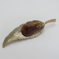 Vintage gold coloured costume jewellery leaf brooch