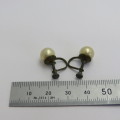 Pair of vintage imitation pearl screw on earrings