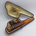 Antique dog themed meerschaum pipe with broken mouthpiece