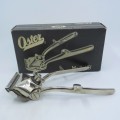 Vintage John Oster model B hair clippers in box