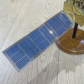 Beautiful brass Land Satellite model presented to Willem J Botha of South African Space Program