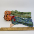 Pair of vintage hand puppets with rubber heads