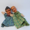 Pair of vintage hand puppets with rubber heads