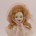 Royal Doulton and Nisbet 1982 porcelain doll - Pink sash - No. 3147 of 5000