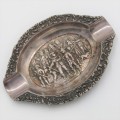 Silver ashtray with Musketeer theme in centre