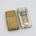 Pair of electric pocket lighters - One working