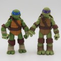 Pair of Ninja Turtles figurines - 2012 Viacom - No weapons