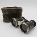 Antique pair of opera binoculars with leather pouch