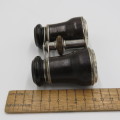 Antique pair of opera binoculars with leather pouch