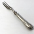 Beautiful fruit fork with British hallmarked silver handle