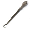 Boot lace puller with silver handle