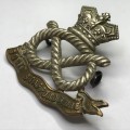 Boer War South Staffordshire Regiment cap badge with lugs - left ribbon broken
