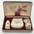 Vintage Remington Rollectric auto-home electric shaver