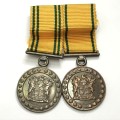 Pair of SA Prison Service miniature medals - 10 Year #1029, 20 year #457