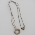 Sterling silver `Circle of Life` pendant with silk string necklace Length 40 cm