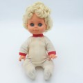 Vintage rubber baby doll with closing eyes