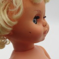Vintage rubber baby doll with closing eyes