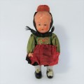 Small vintage boy doll