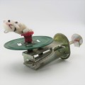 Vintage tin mechanical cat spinner