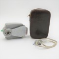 Vintage Ricoh fan flash in leather pouch