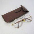 Vintage reading glasses in case