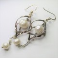 Pair of Sterling Silver earrings with pearls - weighs 8,0g