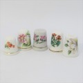 Lot of 5 porcelain flower themed thimbles