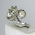 18kt white gold diamond ring with 0,75ct diamond and pearls - weighs 8,5g