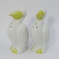 Pair of porcelain Pelican salt and pepper shakers