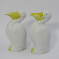 Pair of porcelain Pelican salt and pepper shakers