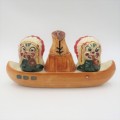 Vintage chiefs salt and pepper shakers on boat stand with mustard pot