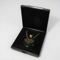 Lancome Magie Noire perfume pendant and necklace
