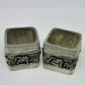 Pair of Andy C salt holders with spoons