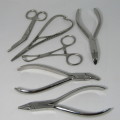 Lot of 6 Dentist stainless steel clamps and tools - unused