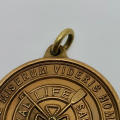 Royal Life Saving Society medallion issued to E Joubert Nov 1954
