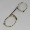 Antique gold coloured spectacle glasses in case