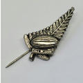 Vintage All Blacks New Zealand rugby pin badge on felt background