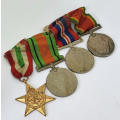 Set of 4 WW2 medals issued to P7007 T.F Barry