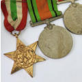 Set of 4 WW2 medals issued to P7007 T.F Barry
